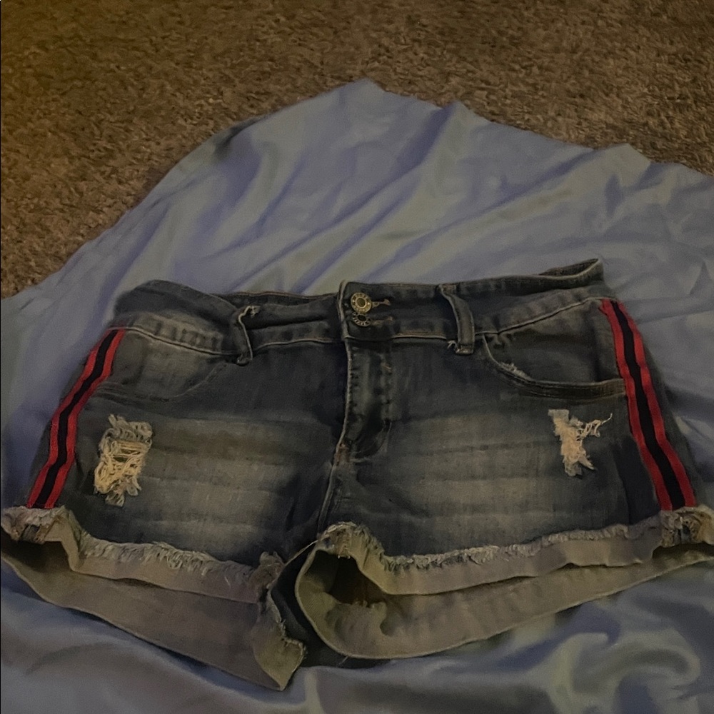 Trendy Distressed Denim Shorts with Red Accents